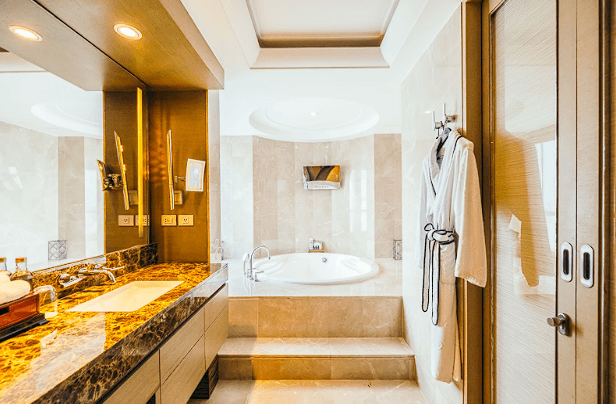High-tech luxury bathroom remodel featuring sleek lighting fixtures