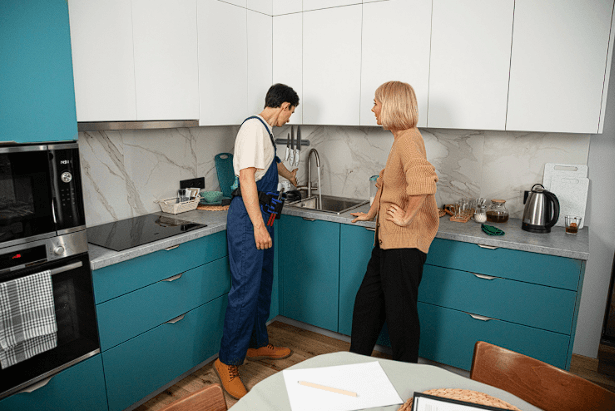 Discussing remodeling ideas with a kitchen remodeling professional